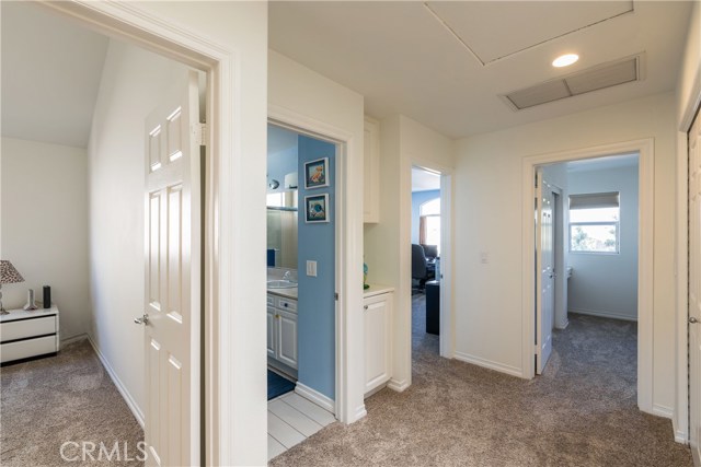 Upstairs Hallway showing 3 Bedrooms, Bathroom, Linen Cupboard, Attic Access & Laundry