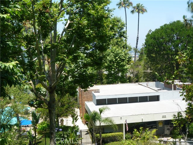 Swimming pool and recreation room can be seen from the balcony.