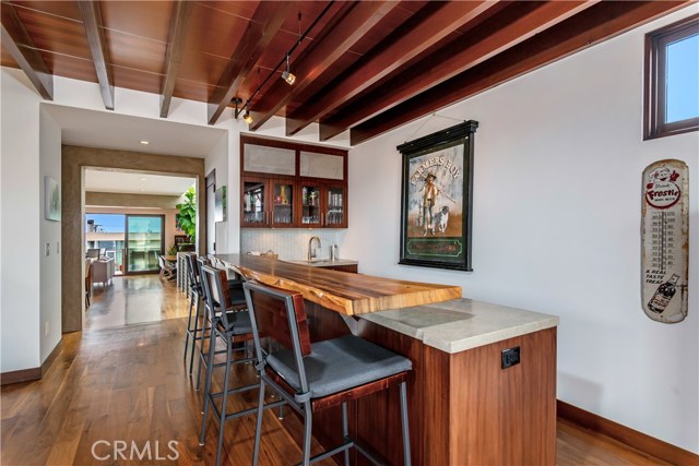 Wet bar off den with Koa wood bar top