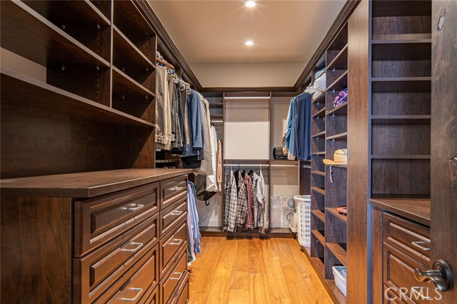 Huge walk-in closet in master bedroom