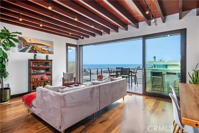 living room and dining room with views of the pacific Ocean, Santa Monica mountains and channel islands