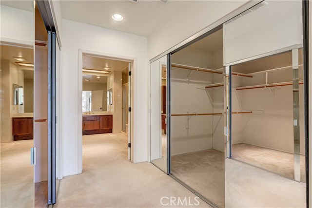 2 huge walk-in closets in front of the bathroom