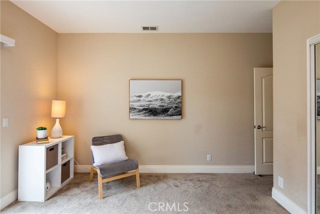 Bedroom #3 - A bright and spacious retreat with large closets and direct access to the private backyard.