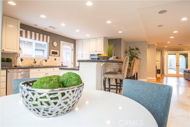 Dining nook adjacent to kitchen ideal for casual meals.