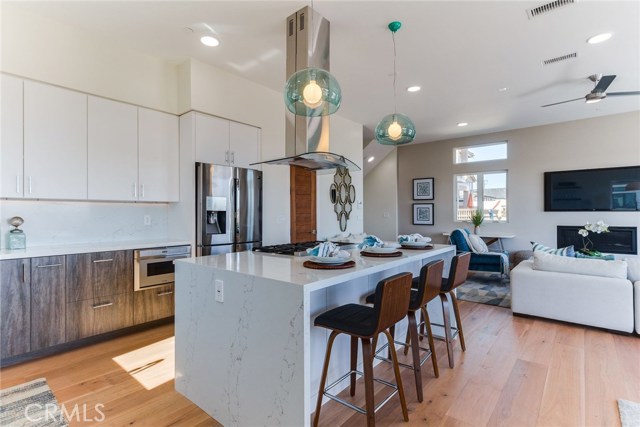 Modern kitchen with Thermador appliances, huge island & Walk-in pantry