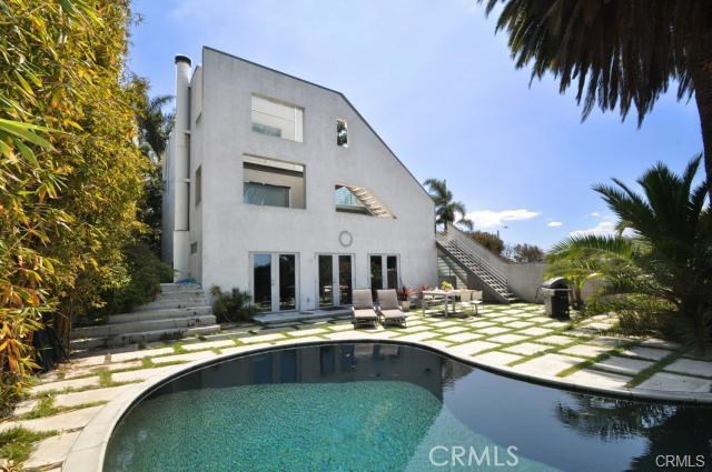 View from the street side... Extremely private enclosed front yard Pool entertainment area and ohhh the architecture!!