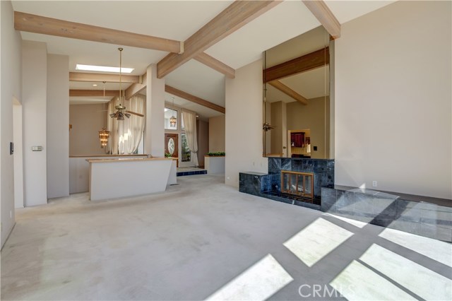 The right living room also has a wet bar and ceiling fan.