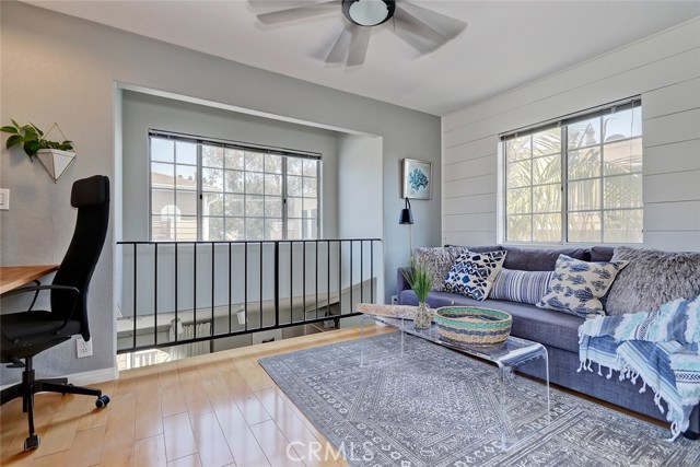 Spacious loft could be used for both an office and guest space.