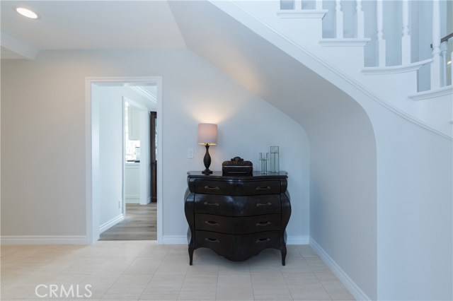 Another view of the entry.  Doorway opens to formal dining room, with kitchen to the left of that.