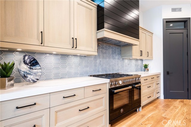 Quality under counter lighting. The outlets are hidden under the counters allowing a clean look on the custom tile backspash.