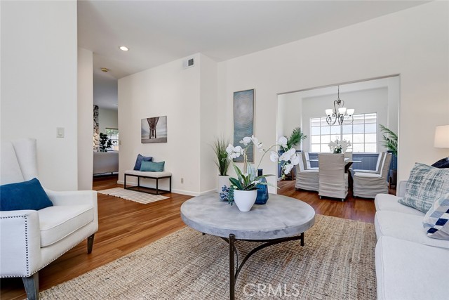 Front living room with gleaming wooden flooring