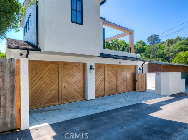 3 car garage with guest/in-law suite located above the garage.  Outdoor shower (not pictured) for when you return from the beach.