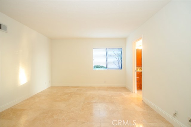 Lower level bedroom with radiant heating floor and Jack n Jill bath