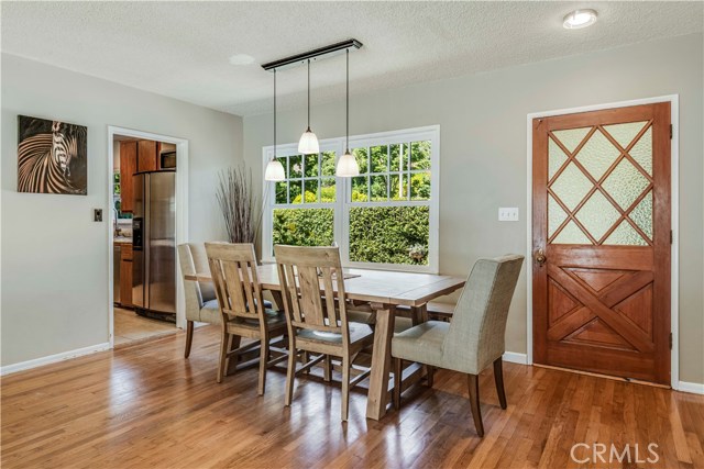 Dining room right off of the kitchen with view of front courtyard