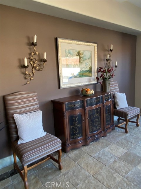 Elegant Front Entrance with tasteful furniture. Comfortable too!