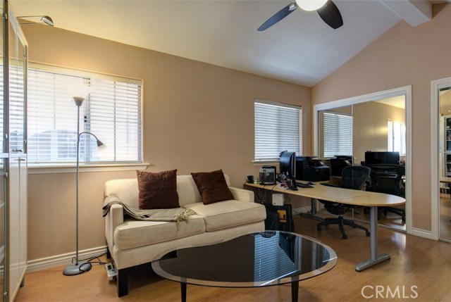 Bedroom 3 of 4, vaulted ceiling, ceiling fan, mirrored wardrobe doors and ample natural light