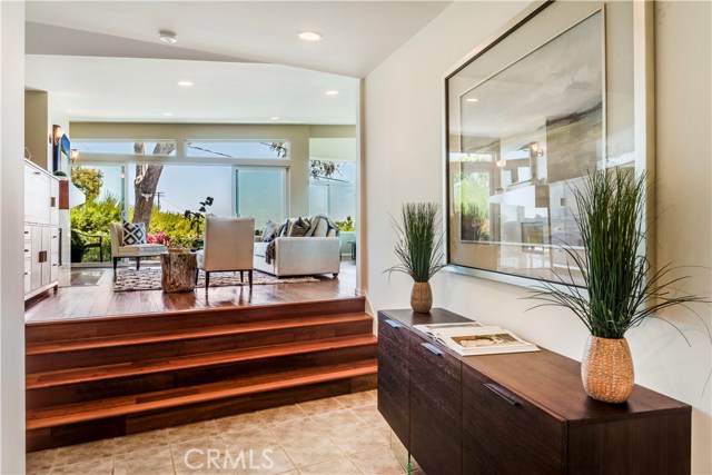 Step up living and dining rooms to take advantage of the Ocean and Catalina View.