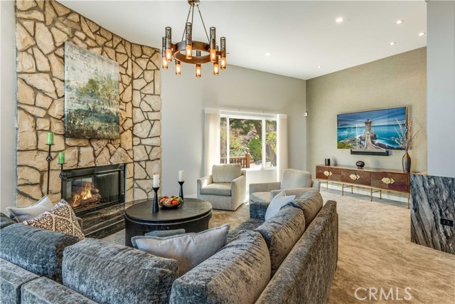 Stone Floor-to-Ceiling Fireplace