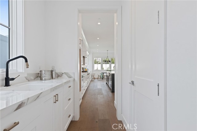 Butler's Pantry seamlessly flows from the kitchen to the formal dining area