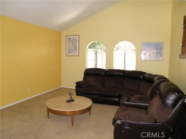Living room with vaulted ceilings