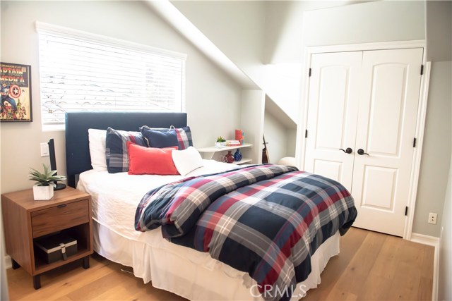 Bedroom #3 with French Oak hardwood floors and a *secret* bonus room perfect for a study room or play area.