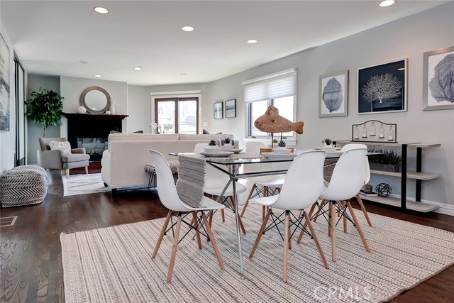 The open floor plan from the formal dining area to the living area and balcony make this a perfect place for family and friends to gather!