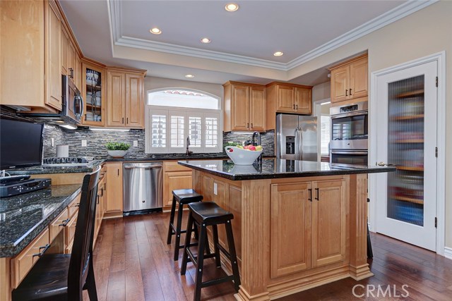 Center island for the chef or breakfast bar. Under cabinet lights.