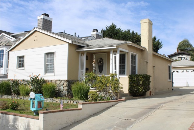 Exterior - home sits up above street