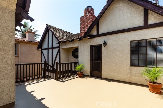 Large upstairs patio. 
 Staircase leads to downstairs patio.