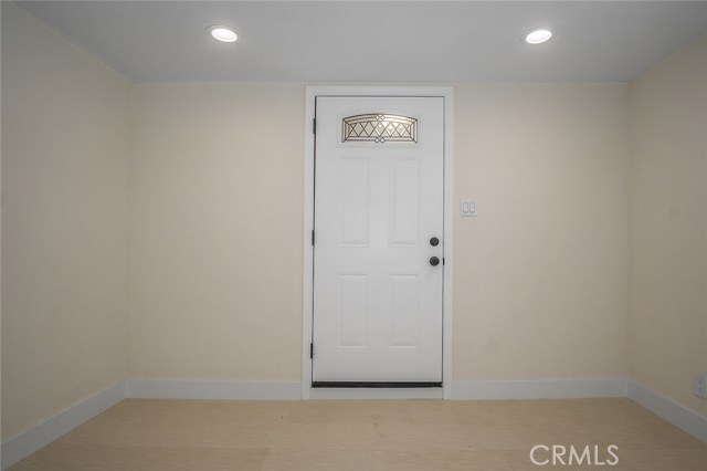 Interior shot of the front door entering the living room