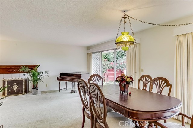 Formal dining room is adjacent to kitchen and living room