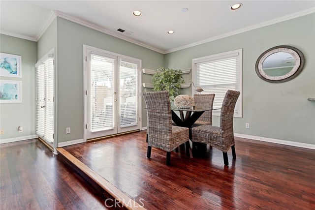 Breakfast Nook Area and Double Set of French Doors to Backyard Patio