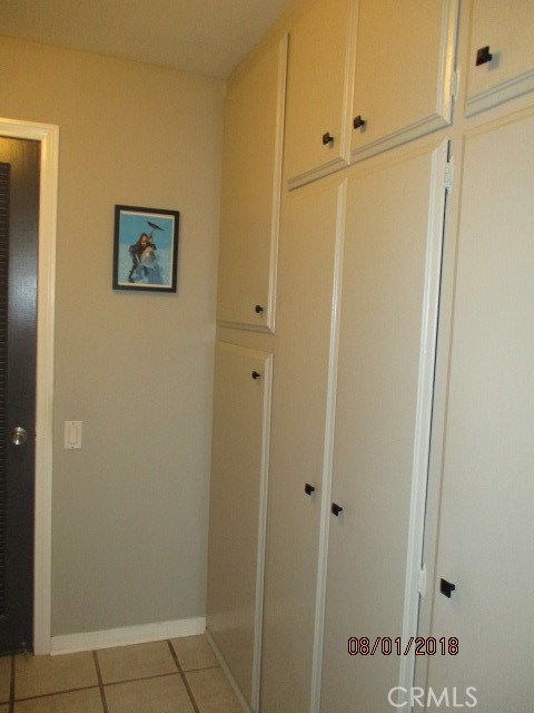 Plenty of storage inside the condo. Wall of closets located in hallway that leads to bedroom and bathroom.