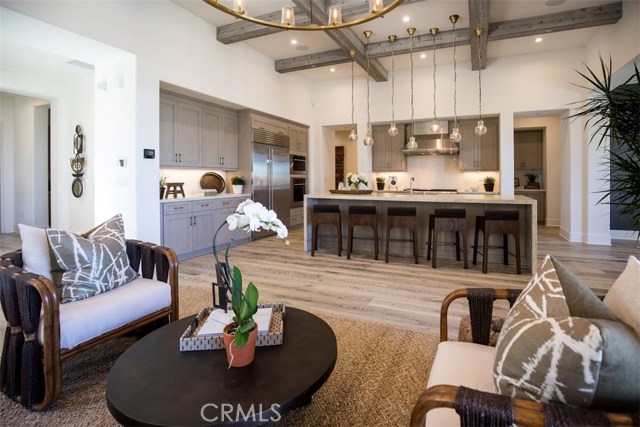 Great room and kitchen, same floorplan as shown in model home.