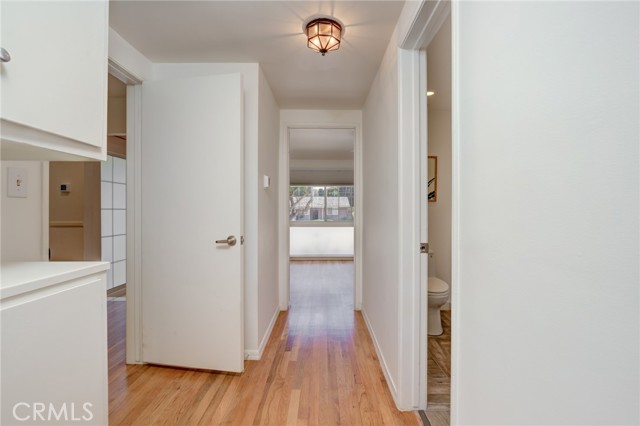 Hallway to other bedrooms and bathroom