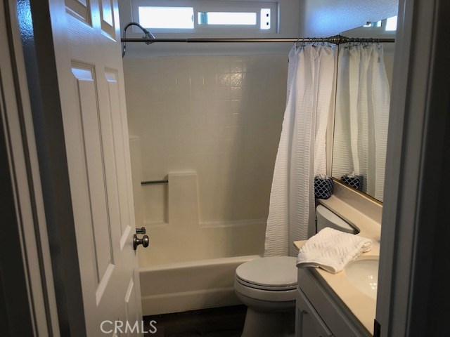 Second Bathroom with tub in shower.