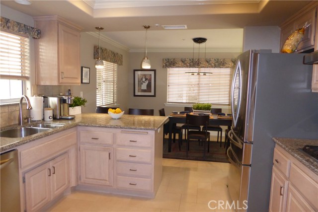 Kitchen with view of Dining area.  Refrigerator included approx. 2.5 yrs old.