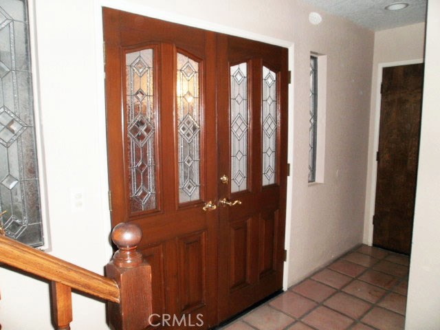 Double door entrance, in side garage door and stairs