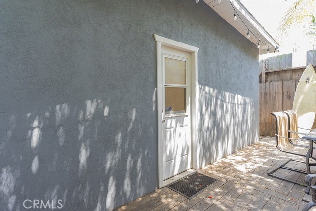 Another view of rear entry to home from backyard area.