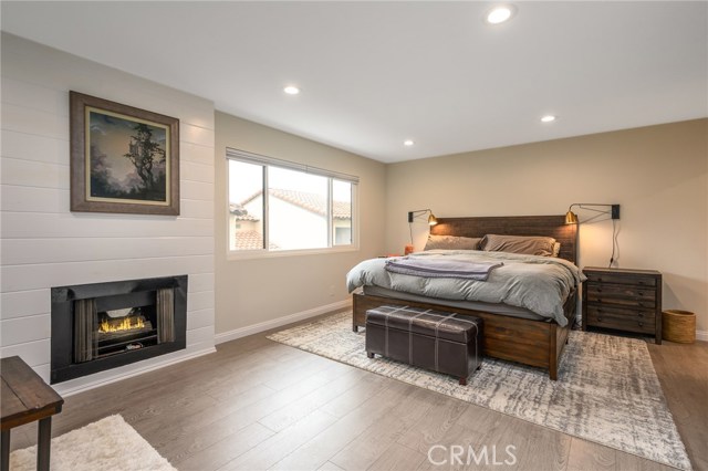 Large master bedroom with fireplace