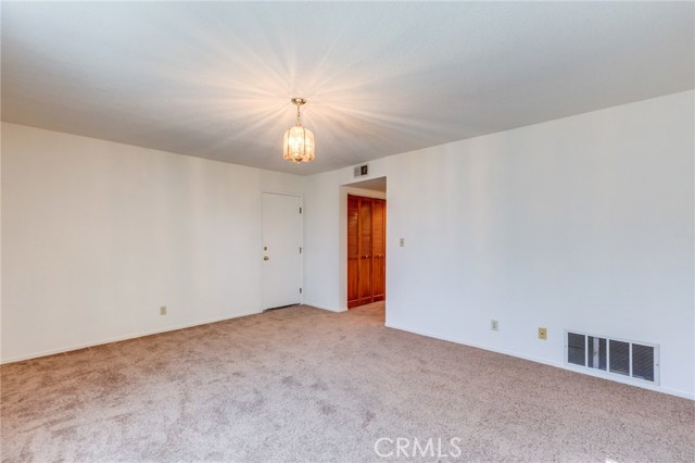 Nearby hallway had laundry closet with washer and dryer hook ups