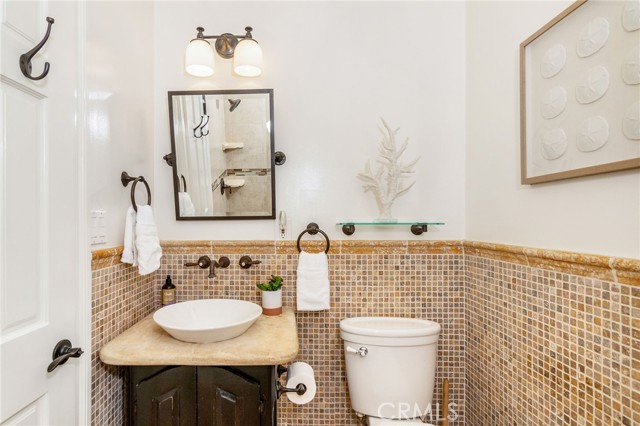 Hall bathroom with bathtub