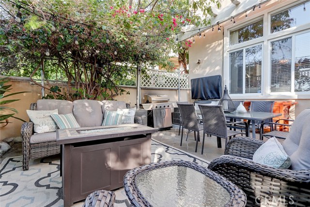 Enclosed private front patio is perfect for BBQing and outdoor entertaining all year round.