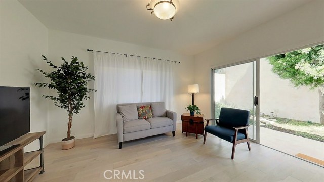 View of the family room and convenient access to the outdoors.