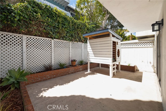 Freshly landscaped yard with kids playhouse