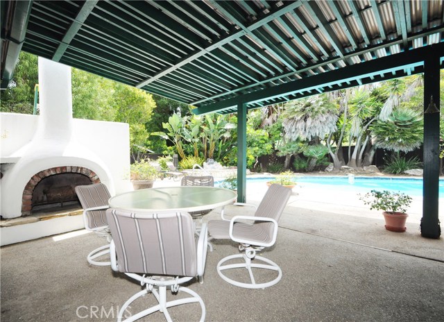 Patio with outdoor fireplace