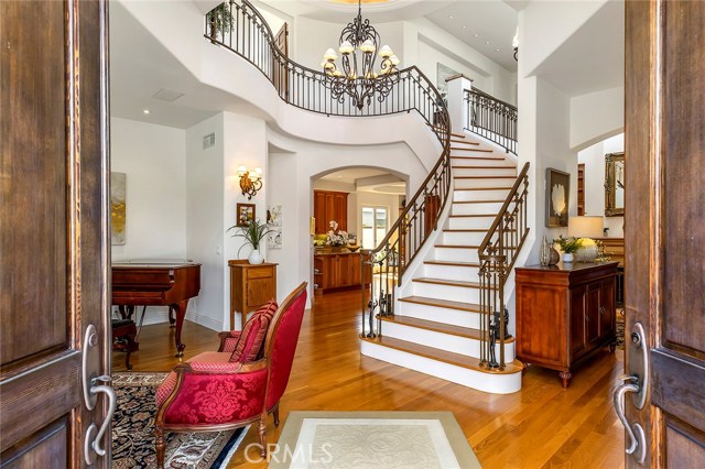 Enjoy the grand entrance and winding staircase.