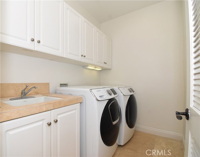 laundry rooms upstairs where the dirty clothes are... what a concept!