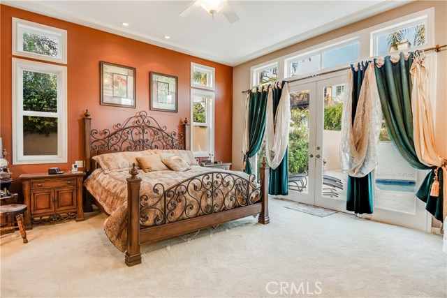 Master Bedroom & French Doors Leading to the Backyard.
