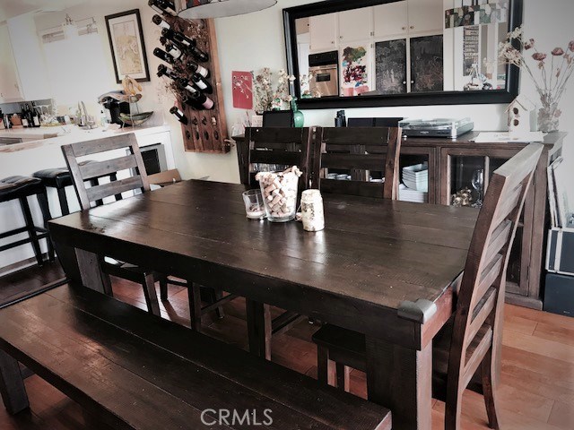 Formal dining area with sliding door leads to the balcony